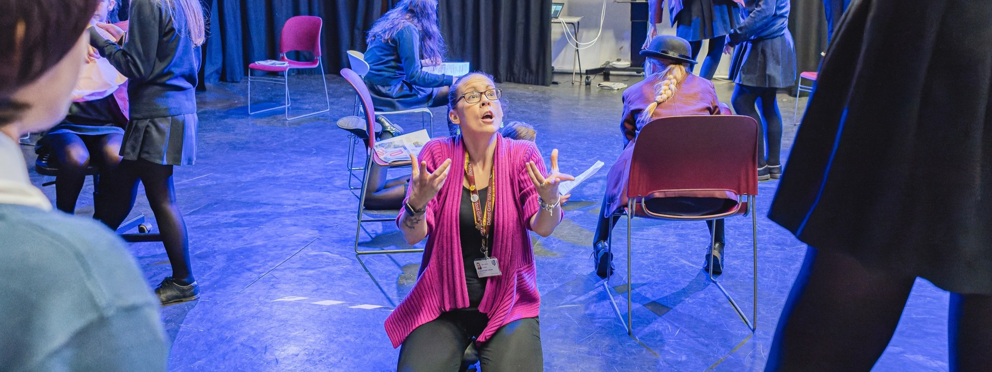 This is an image of 1 teachers doing a teacher training exercise for drama